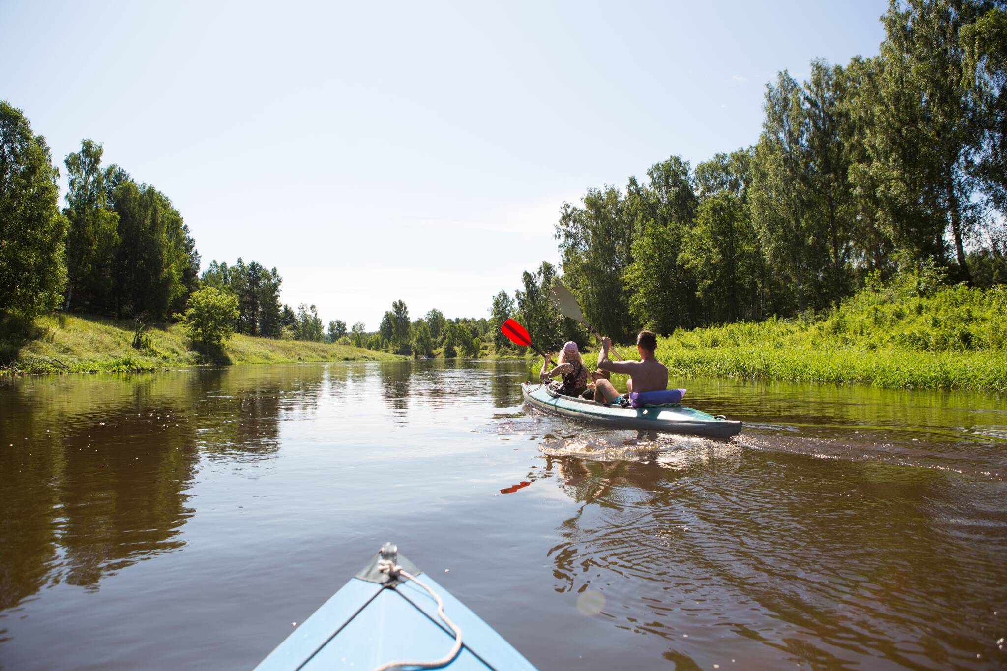 A Couple Of Men And Women Kayak On The River In Th 2024 11 01 15 25 03 Utc